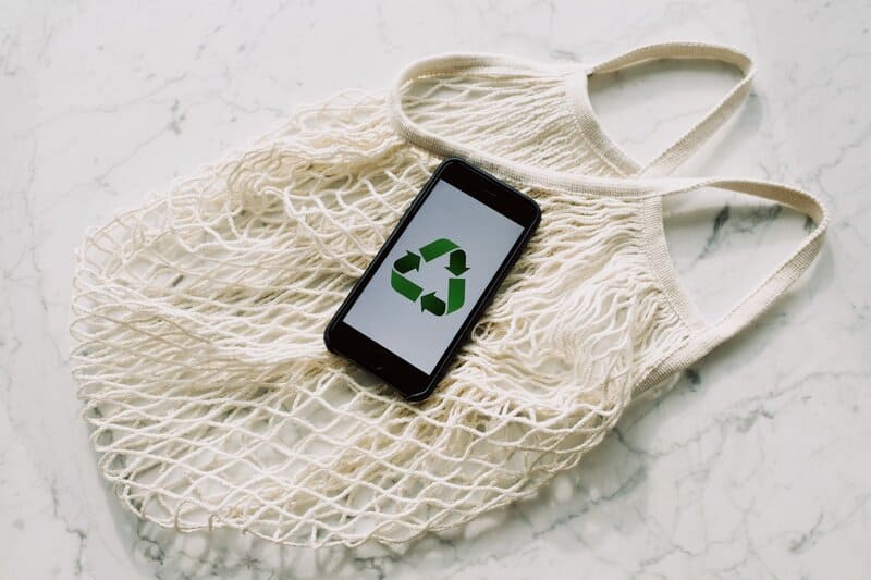 Recycling logo on a reusable fabric bag