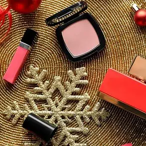 Christmas makeup with decorations on a festive table